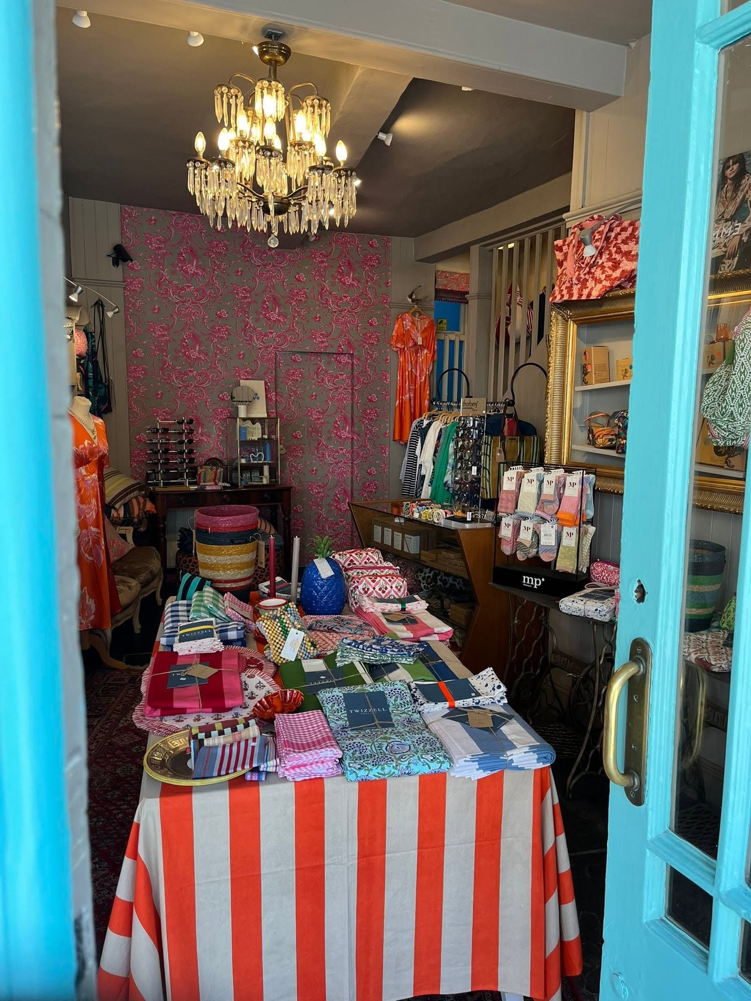 Colourful clothing and accessories inside Ella Cru