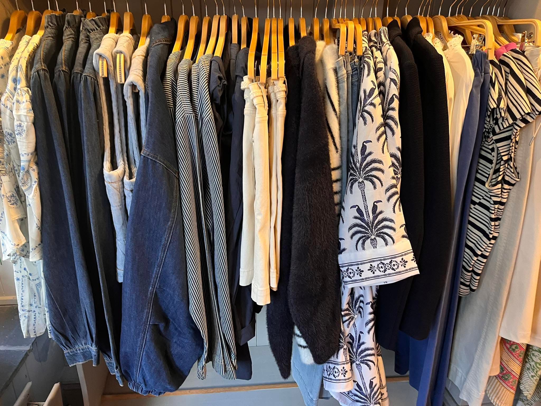 A colourful selection of clothing on the rails at Ella Cru